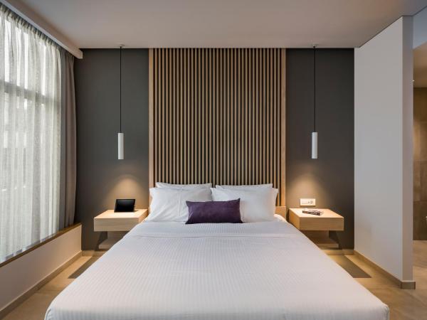 Trianon Luxury Apartments & Suites : photo 6 de la chambre suite 2 chambres supérieure