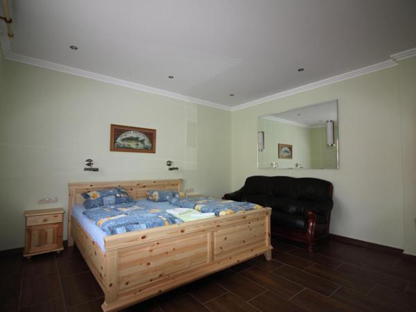 Penzion Olga : photo 10 de la chambre chambre quadruple de luxe