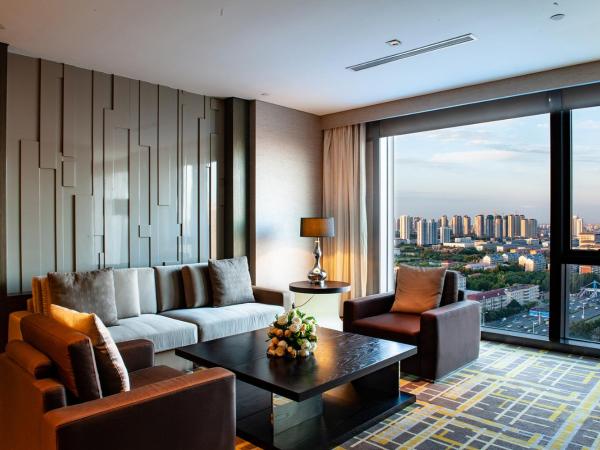 Hyatt Regency Tianjin East : photo 4 de la chambre suite lit king-size