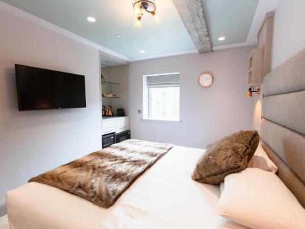 Clarendon Suites : photo 3 de la chambre chambre lit king-size