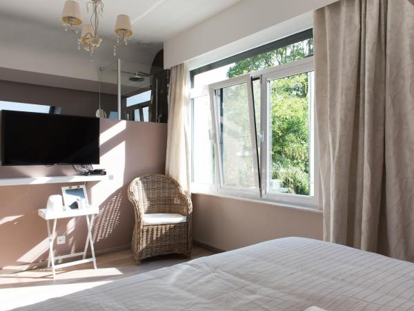 B&B Alegría : photo 2 de la chambre chambre lit king-size - vue sur jardin