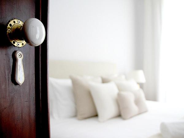 Oryza Guest House& Suites : photo 1 de la chambre suite lit king-size