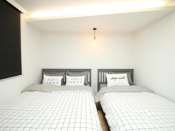 Heima Guesthouse Hongdae : photo 5 de la chambre chambre triple avec salle de bains privative