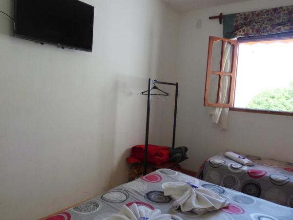 Sayta Hostal : photo 6 de la chambre chambre quadruple avec salle de bains privative