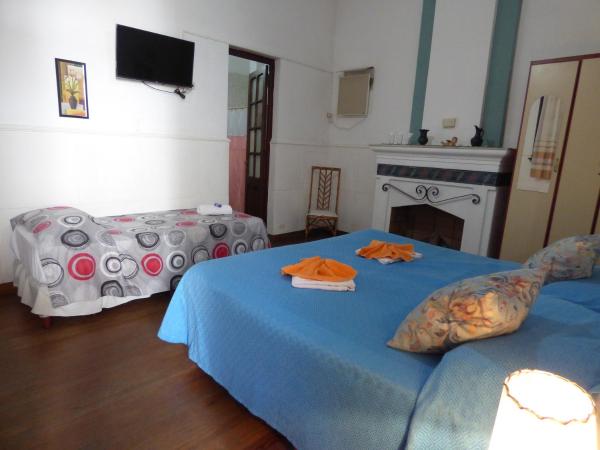 Sayta Hostal : photo 4 de la chambre chambre quadruple avec salle de bains privative