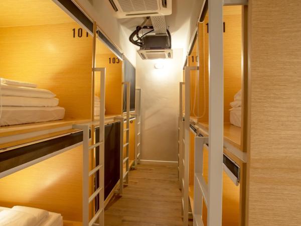 Yote 28 : photo 10 de la chambre lit simple dans dortoir pour hommes
