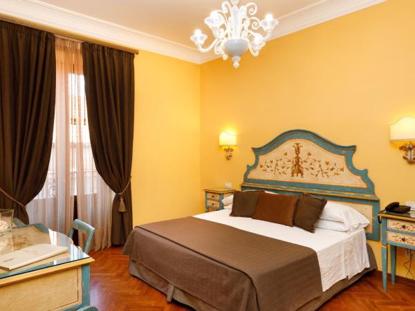 Hotel Palazzo Guardati : photo 1 de la chambre chambre triple supérieure