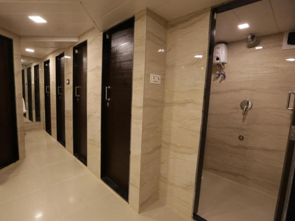 Qubestay Airport Capsule Hotel & Hostel : photo 7 de la chambre lit simple dans dortoir mixte