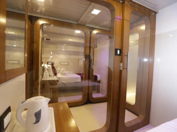 Qubestay Airport Capsule Hotel & Hostel : photo 5 de la chambre lit simple dans dortoir mixte