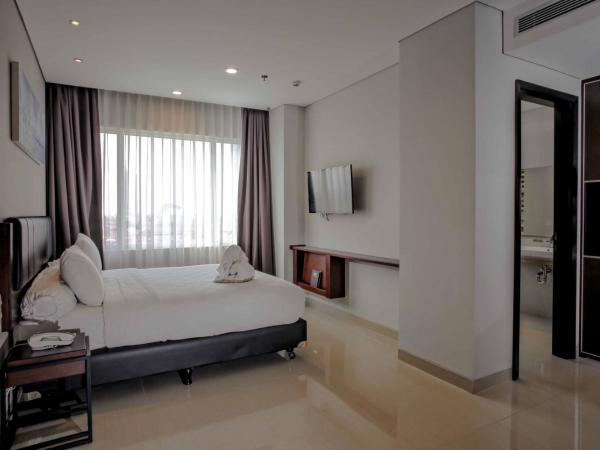PrimeBiz Hotel Surabaya : photo 1 de la chambre chambre double deluxe