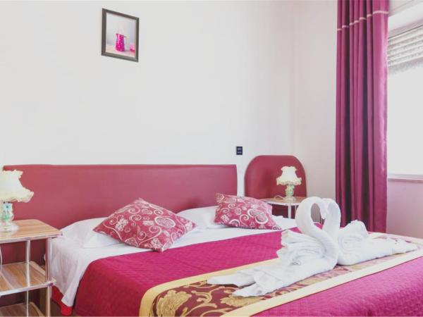 B&B Ciclamino : photo 1 de la chambre chambre triple de luxe