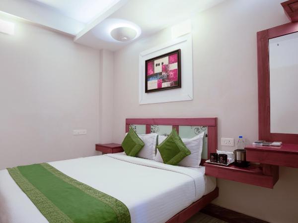 Treebo The Qasr : photo 2 de la chambre [sanitized] single room