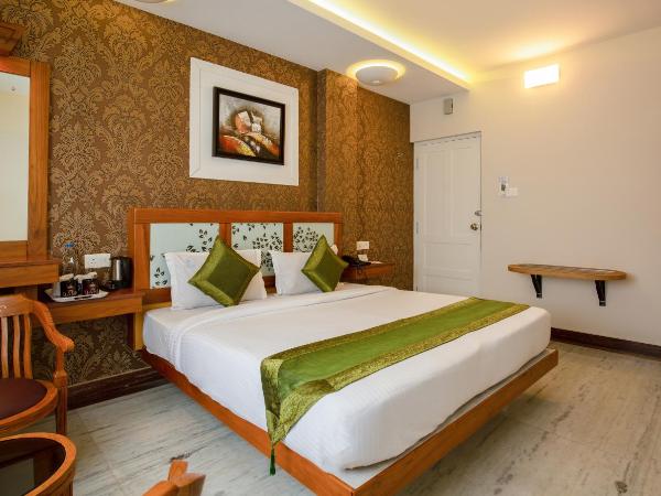 Treebo The Qasr : photo 1 de la chambre [sanitized] standard double room