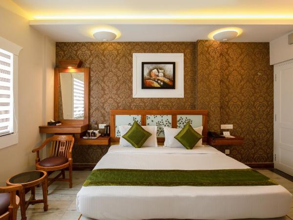 Treebo The Qasr : photo 5 de la chambre [sanitized] standard double room