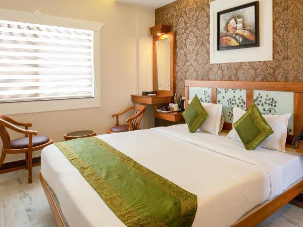 Treebo The Qasr : photo 4 de la chambre [sanitized] standard double room