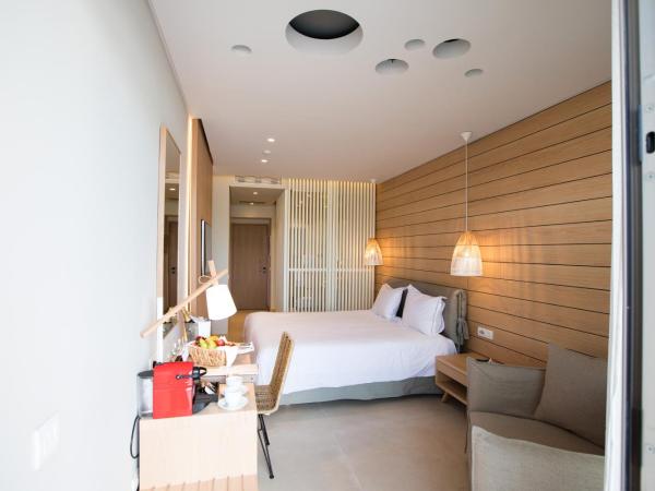 Ikones Seafront Luxury Suites : photo 4 de la chambre suite standard