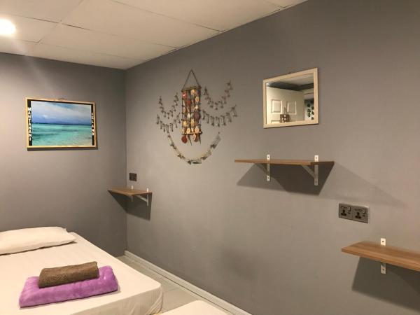 Nusantara Mattwaddien Hostel : photo 6 de la chambre chambre triple Économique