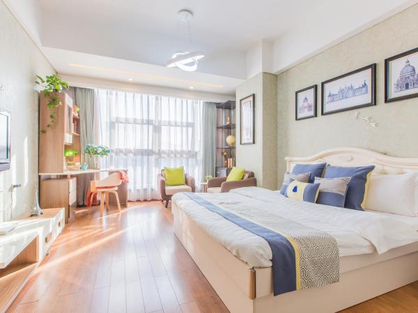 Westlake Service Apartment : photo 8 de la chambre chambre lit queen-size