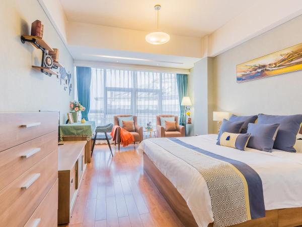 Westlake Service Apartment : photo 5 de la chambre chambre lit queen-size