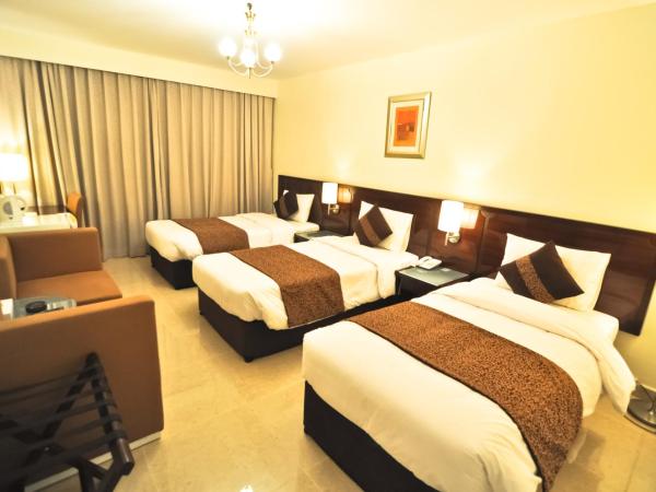 Phoenicia Grand Hotel : photo 4 de la chambre chambre triple standard