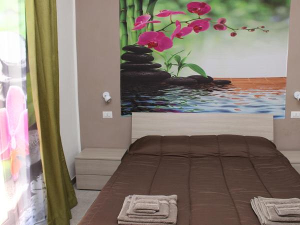 La fleur : photo 4 de la chambre chambre familiale avec salle de bains privative