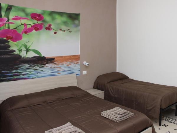 La fleur : photo 5 de la chambre chambre familiale avec salle de bains privative