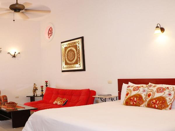 Merida Santiago Hotel Boutique : photo 6 de la chambre suite supérieure avec baignoire spa - vue sur piscine