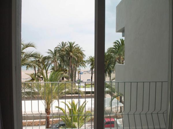 Hotel El Palmeral : photo 1 de la chambre chambre lits jumeaux - vue sur jardin