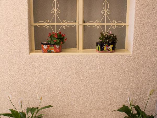 Hostal Tlaquepaque : photo 5 de la chambre chambre triple avec salle de bains commune