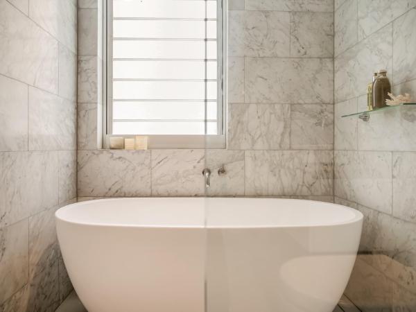 Tamarama Apartments : photo 10 de la chambre penthouse