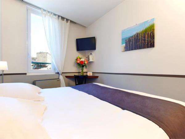 Kyriad Nimes Centre : photo 1 de la chambre chambre simple Économique 