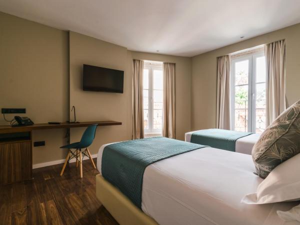 Rossio Boutique Hotel : photo 5 de la chambre chambre double ou lits jumeaux