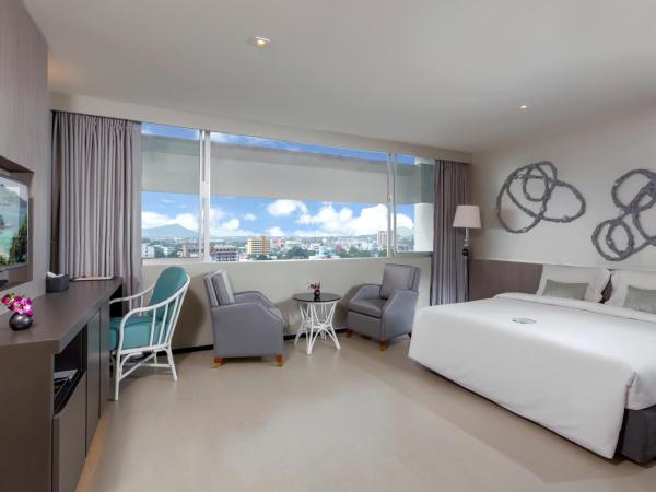 Pearl Hotel Phuket : photo 2 de la chambre suite junior