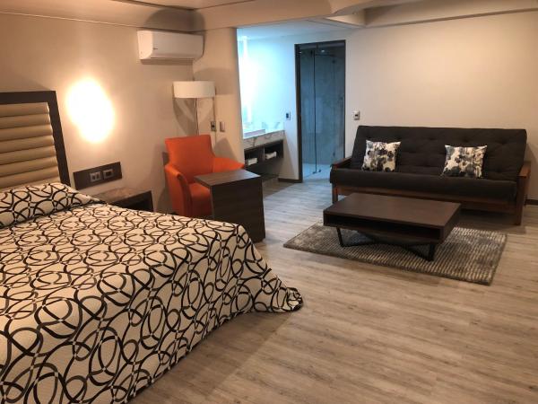 Econo Express Hotel : photo 10 de la chambre suite deluxe avec lit king-size