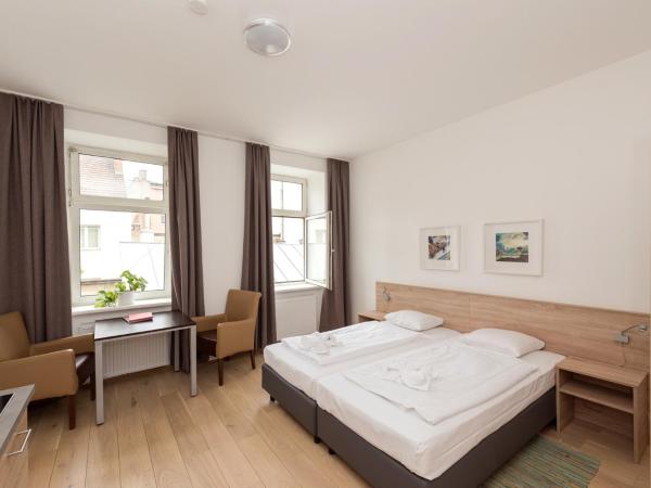 Metro Apartments Vienna : photo 2 de la chambre studio