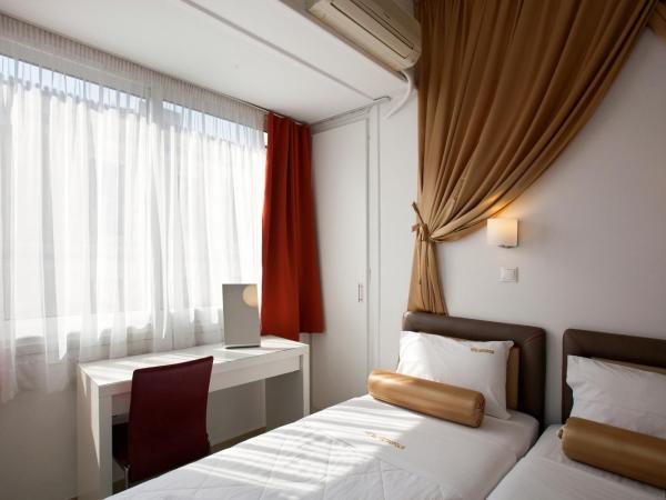 Metropolis Hotel : photo 8 de la chambre chambre double ou lits jumeaux standard