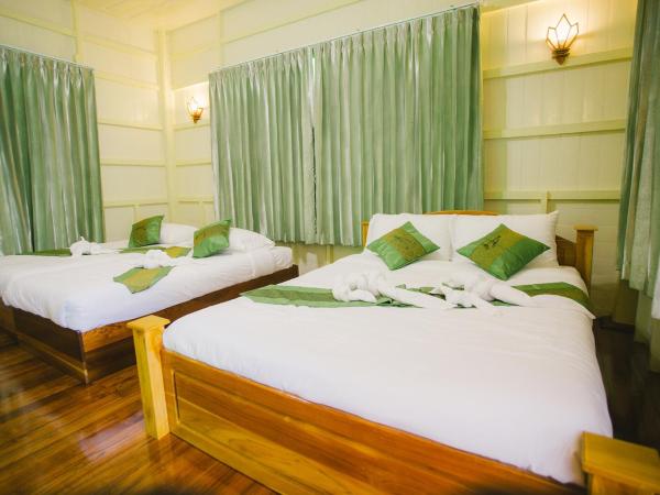 SuanTung Coffee & Guesthouse : photo 1 de la chambre chambre familiale supérieure