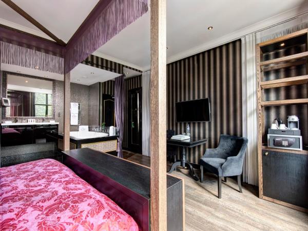 The Pavilions Amsterdam, The Toren : photo 4 de la chambre chambre supérieure de luxe avec baignoire spa et vue sur le canal