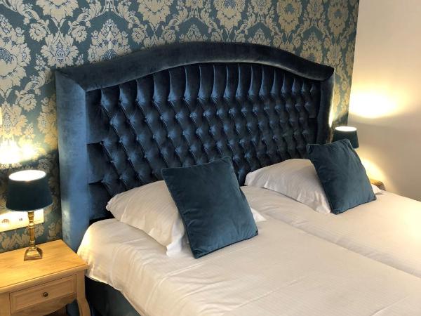 Golden Tree Hotel : photo 5 de la chambre chambre lits jumeaux