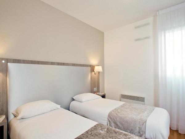 Séjours & Affaires Reims Clairmarais : photo 4 de la chambre studio (2 adultes)