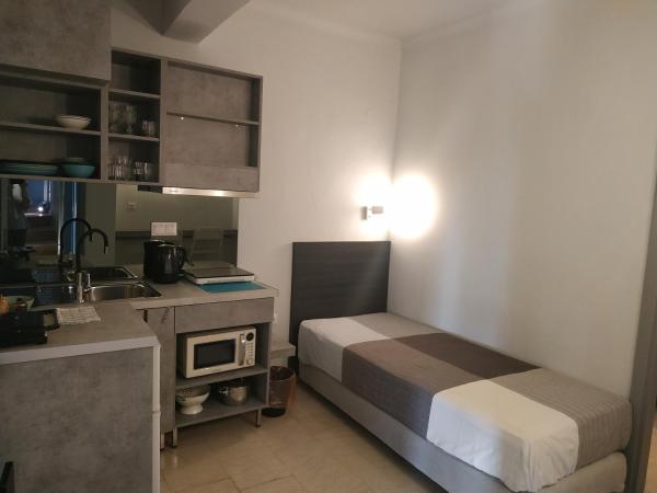 LOC HOSPITALITY Urban Suites : photo 4 de la chambre appartement 1 chambre