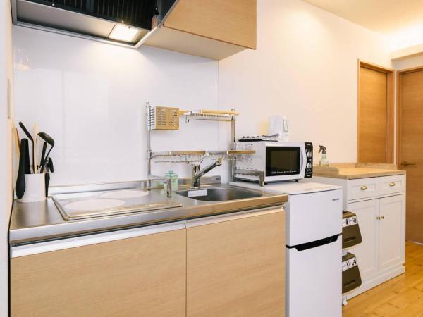 TEN APARTMENT HOTEL : photo 5 de la chambre appartement 3 chambres