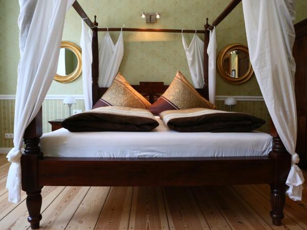 Garden Living - Boutique Hotel : photo 5 de la chambre grande chambre double - vue sur jardin