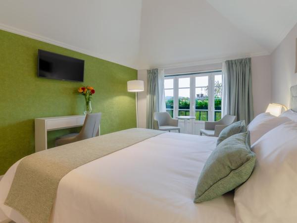 Ver Belém Suites : photo 7 de la chambre chambre lit queen-size - vue sur jardin