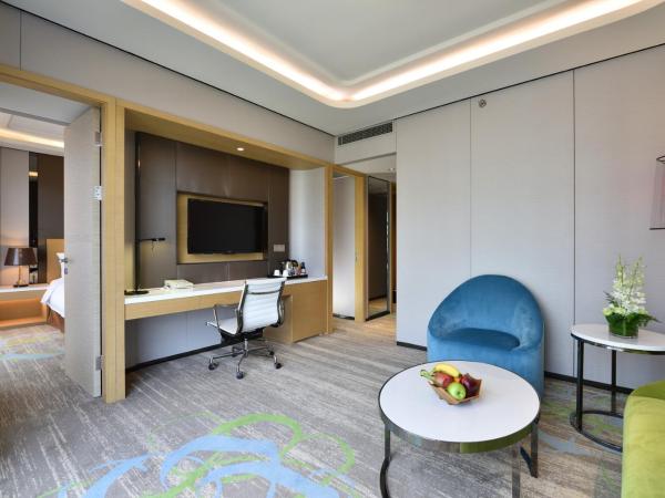 Hotel Equatorial Shanghai : photo 2 de la chambre suite exécutive