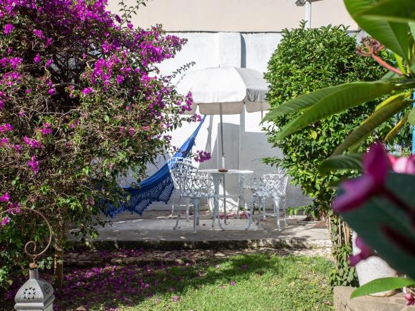 Pousada Casa Búzios : photo 4 de la chambre chambre double deluxe avec terrasse - vue sur jardin