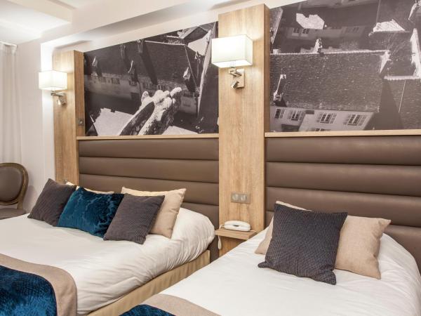 Logis - Le Christina : photo 10 de la chambre chambre triple confort