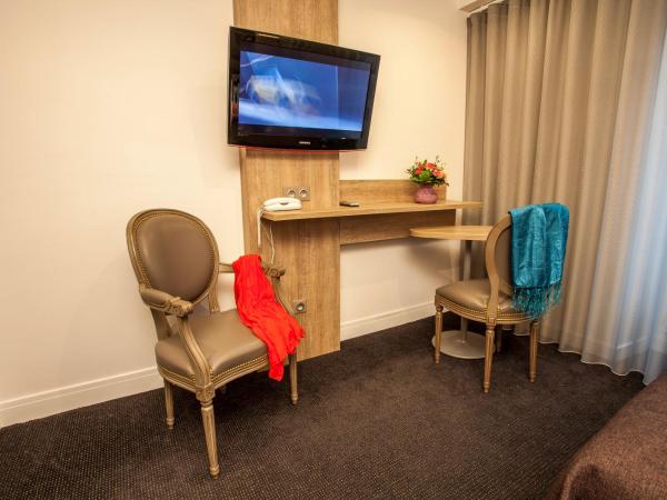 Logis - Le Christina : photo 2 de la chambre chambre lits jumeaux confort