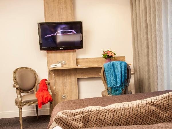 Logis - Le Christina : photo 4 de la chambre chambre lits jumeaux confort