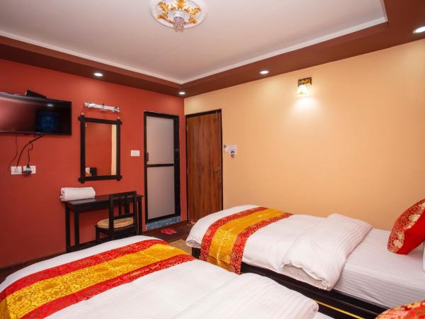 Gurung's Home : photo 5 de la chambre chambre lits jumeaux deluxe